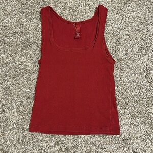 Red skims top